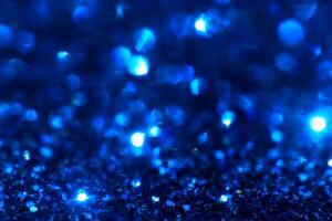 Blue Sparkling Glitter bokeh Background. photo