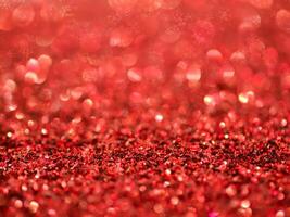 Red Sparkling Glitter bokeh Background. photo