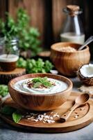 AI generated A bowl of yogurt with a spoon on a cutting board photo