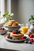 AI generated Stack of delicious pancakes topped with fresh berries and blueberries on a plate photo