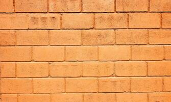 Brick wall or red brick dark tone of color for background texture photo