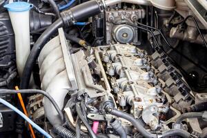 The engine room of car with car valve system open for service photo