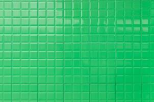 Green ceramic wall for texture and background photo