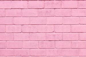 Light pink color brick wall close up image row brick and cement block background and texture photo