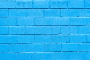 a blue brick wall with a white background photo