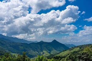 Nature View Wide angle of mountains blue sky and white clouds photo