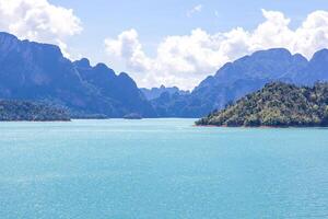 Water storage electricity dams river and blue sky Travel and leisure,Ratchaprapa Dam Surat Thani in Thailand a beautiful tourist destination photo