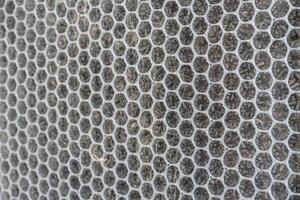 Close up carbon filter and cat fur on net surface cleaning  air purifier in service check photo