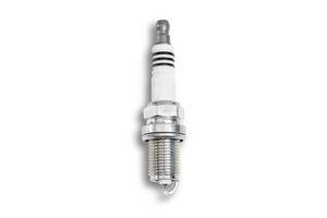 Car spark plug in white background for texture copy space of Technician and service concept photo