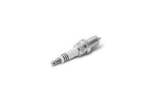 Car Iridium spark plugs in white background for texture copy space of Technician and service concept photo