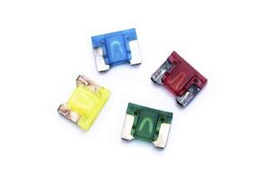Old Car fuse colorful color on white background micro size use for protection in electric system of car photo