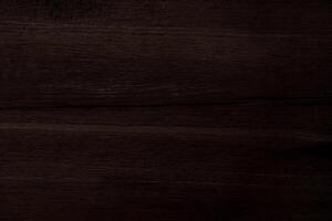 Dark brown wood and broken in pattern with a rough surface  for texture and background photo