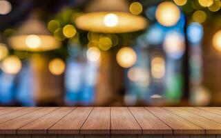 Empty wooden table top with lights bokeh on blur restaurant background photo