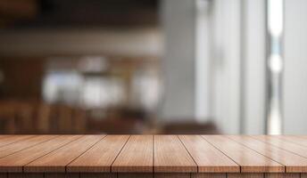 Empty wooden table top with lights bokeh on blur restaurant background. photo