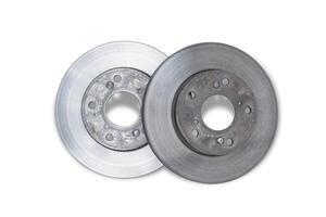 Old disk brake of car with rust and wear and tear from use on the white background photo