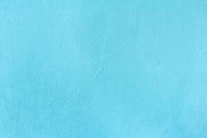Light Blue plastel color cement wall for texture and background photo