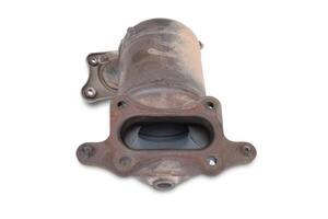 Damaged Catalytic of car in exhaust system on white background photo