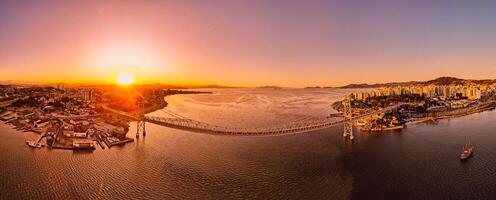 Panoramic view of Hercilio luz bridge with sunset light in Florianopolis, Brazil photo