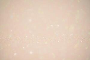 Beige glitter background. Mixed background, the main part is defocused and the thin focal part. photo