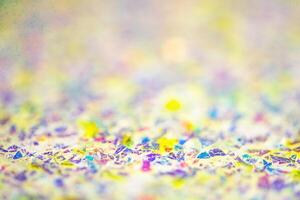 Abstract multicolored glitter background. A background with a thin focal part and a defocus part. photo