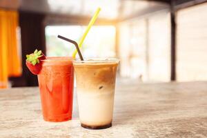 Summer refreshing drink, fruit strawberry frappe, smoothie, juice, ice and sparkling water Ice latte coffee photo