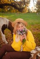 Beautiful screensaver, background, autumn forest, woman and pony in nature, concept of love, peace and goodness. posy. photo