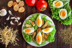 Instructions for the preparation of Caesar salad. photo