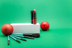 Christmas, New Year's background for make-up artist. brushes, Christmas decorations, spruce. Empty space for text. photo