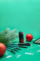 Christmas, New Year's background for make-up artist. brushes, Christmas decorations, spruce. Empty space for text. photo