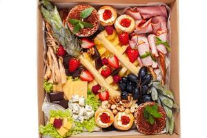 Healthy food delivery. Take away of natural organic low carb. Eat right concept, fitness nutrition take away in boxes, cutlery and package, top view, flat lay Food delivery for the holiday photo