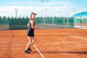 Tennis court, athletic body. Fitness, weight loss photo