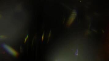 ligero fugas 4k imágenes. lente resplandor llamarada bokeh superposiciones, quemar fuego antecedentes. destello rayos efecto video