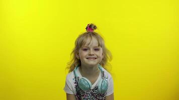 Bored lazy child looking at camera, listening to boring story, not interested in communication video