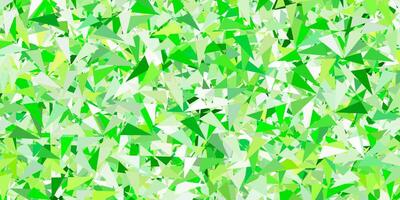 Light green, yellow vector pattern with polygonal shapes.