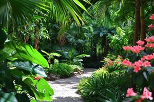 ai generado vibrante verdor, exótico flores, y palma arboles crear un como un paraíso verano refugio foto