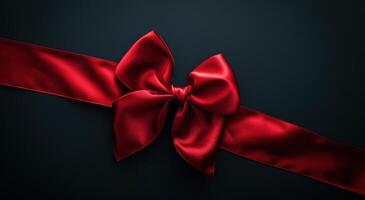 AI generated a bow with a red ribbon on a dark background photo