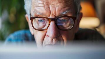 AI generated Generative AI, Senior man working with a laptop computer at the table, wearing glasses, learning to use a computer photo