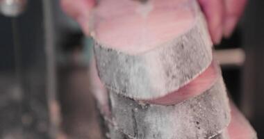 Vendor Puts A Slice Of Salmon Steak  On Top. close up video