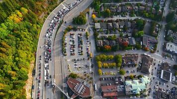 Top down view on Horseshoe Bay, houses, nature and car queue on the ferry video