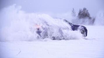 Sliding on an ice line. Snow drifting. snowy land road at winter photo