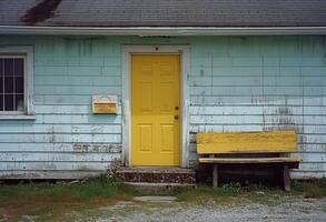 ai generado un amarillo puerta siguiente a un blanco de madera casa en muelle foto