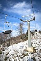 Chair Lift and Snow photo