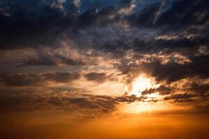 Sunset sky with multicolor clouds photo