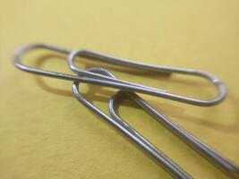 Paper clips and pins for stationery photo