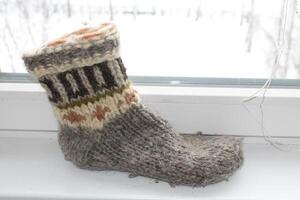 Warm wool socks made of natural sheepskin photo