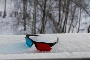 Watching movies with anaglyph 3D glasses photo