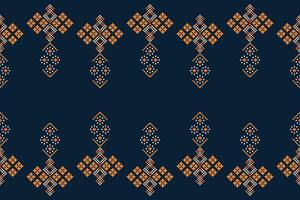 Ethnic geometric fabric pattern Cross Stitch.Ikat embroidery Ethnic oriental Pixel pattern navy blue background. Abstract,vector,illustration. Texture,clothing,scarf,decoration,motifs,silk wallpaper. vector