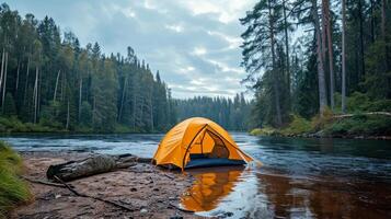 AI generated orange tourist tent stands on the river bank surrounded by a pine forest with copy cpace photo