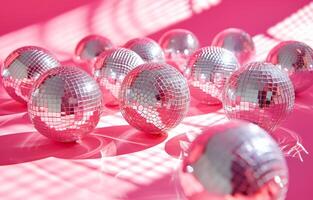 AI generated pink and silver disco balls on a pink surface photo