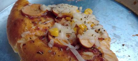 Corn pizza with cheese and sausage photo